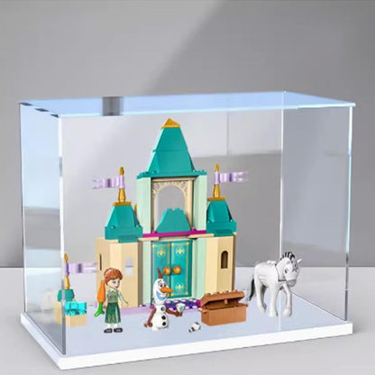 Clear acrylic display case with printed backdrop around a small castle model – view 3