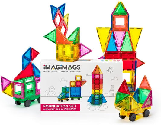 Rainbow magnetic building tiles assembled into a tower and house shapes
