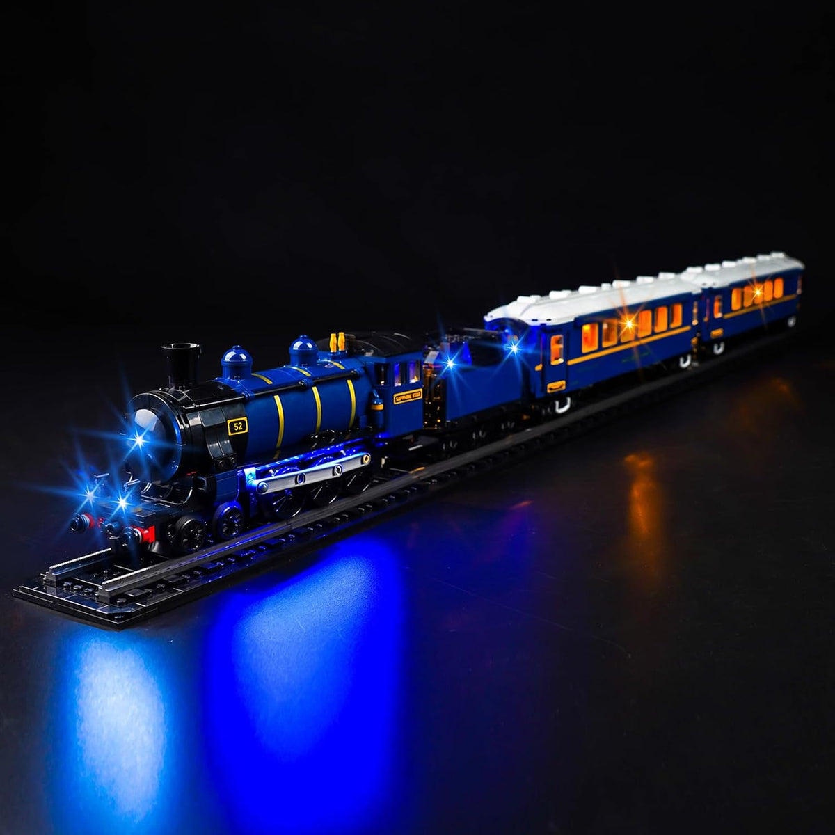 Brick-built vintage express train lit by warm LED lights in its carriages – view 2