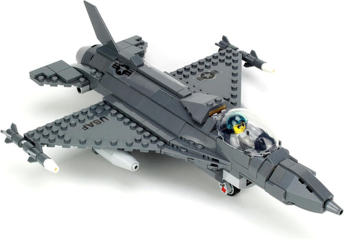 Gray brick-built fighter jet with landing gear down and pilot minifigure beside it