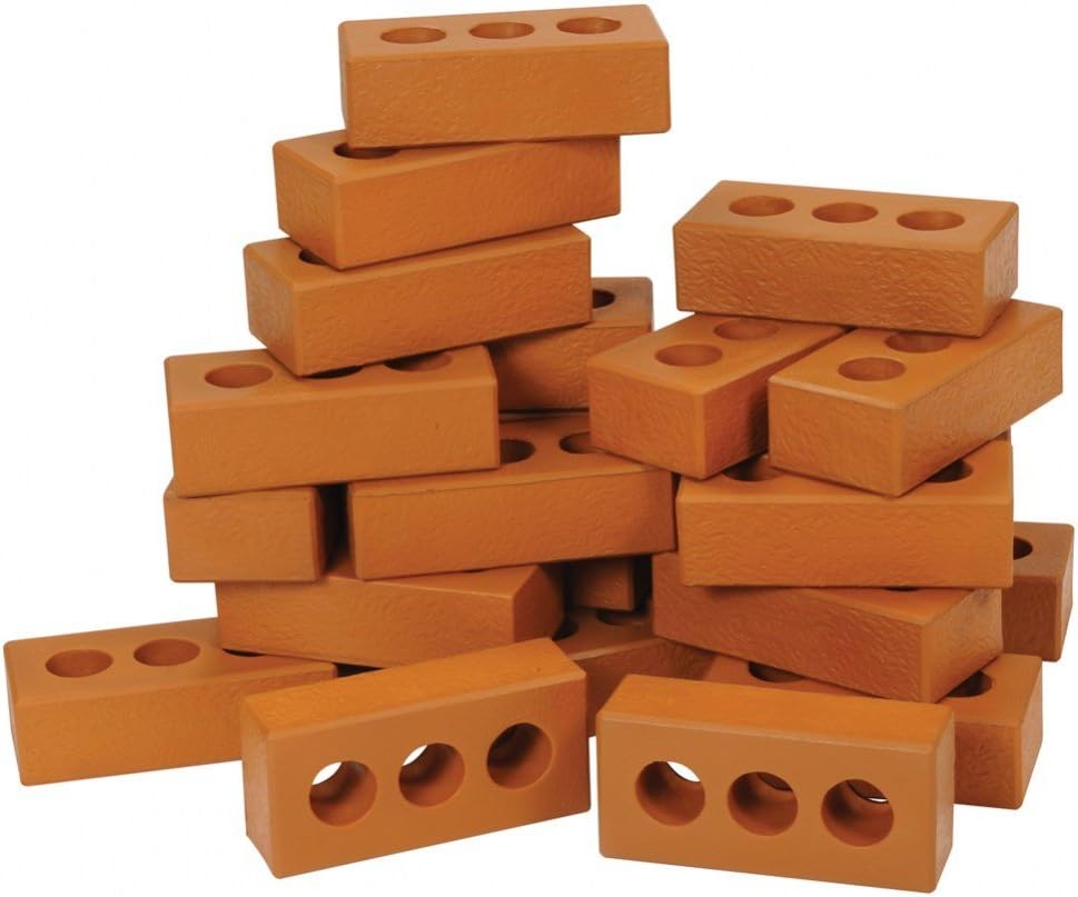 Twenty-five soft foam bricks stacked into a small wall and tower