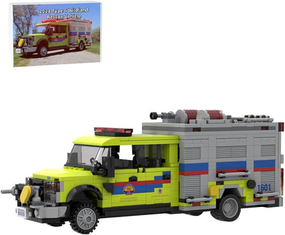 Yellow-green and white brick-built fire rescue truck with open hood