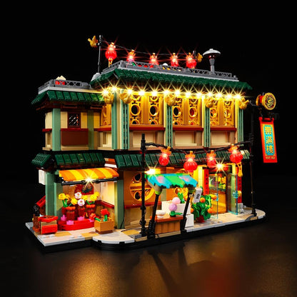 Brick-built Lunar New Year family dinner house with red lanterns lit by LEDs – view 2