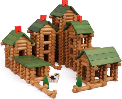 Wooden toy logs stacked into a small cabin with a green roof