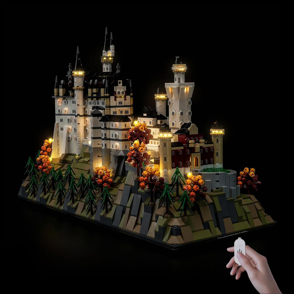 Neuschwanstein Castle brick model with towers and windows lit by LED lights