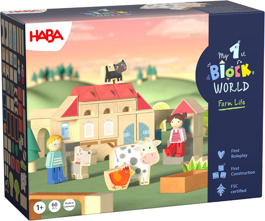 Colorful wooden farm blocks stacked into barn, animals and fences