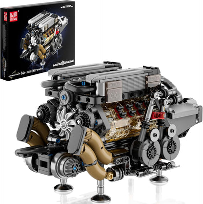Brick-built W16 engine model with transparent cylinders and visible pistons and gears