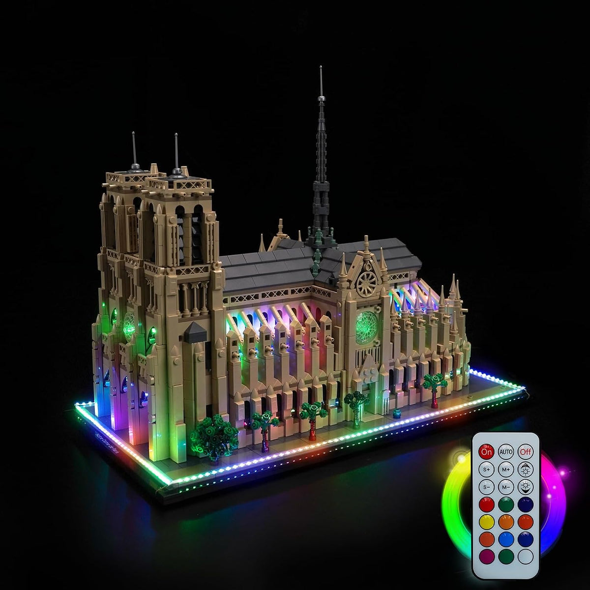 Brick-built Notre-Dame cathedral model with colorful LED light glowing through the windows