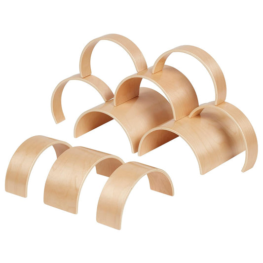 Natural wooden tunnel and arch blocks arranged in a row