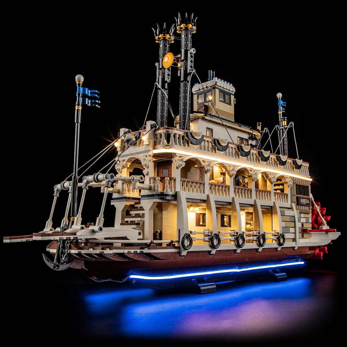 Paddle-wheel river steamboat brick model illuminated with LED lights