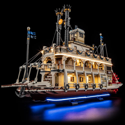 Paddle-wheel river steamboat brick model illuminated with LED lights