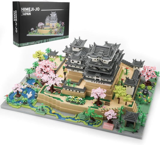 Micro block model of white Himeji Castle with tiered roofs and stone base