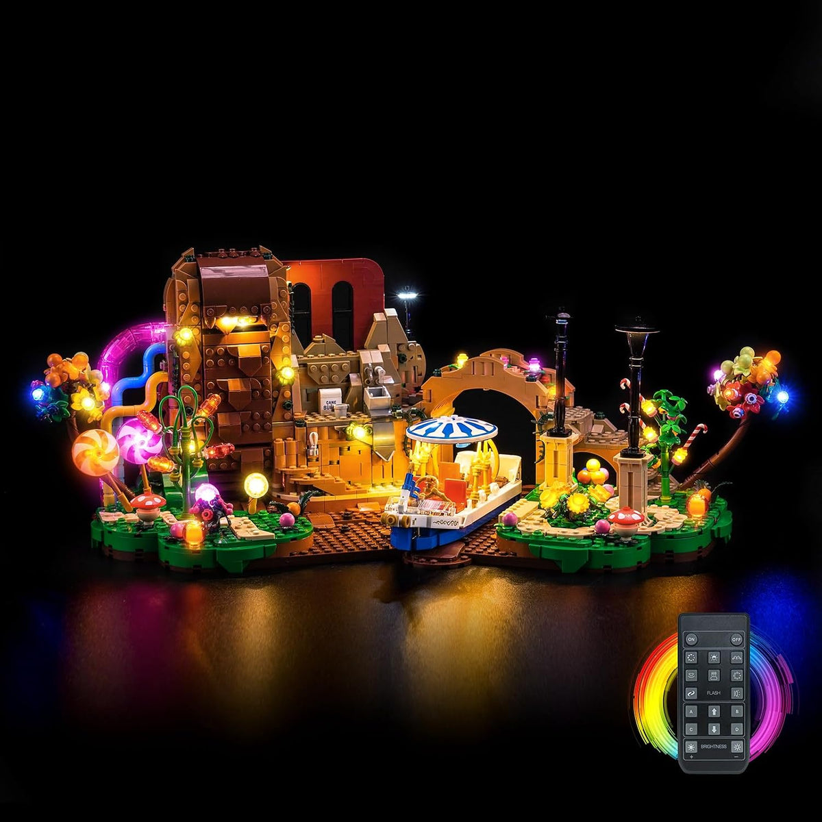 Candy factory brick model lit up with colorful LED lights from an add-on kit