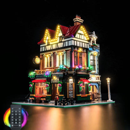 Tudor-style half-timbered street corner brick model glowing with LED window lights