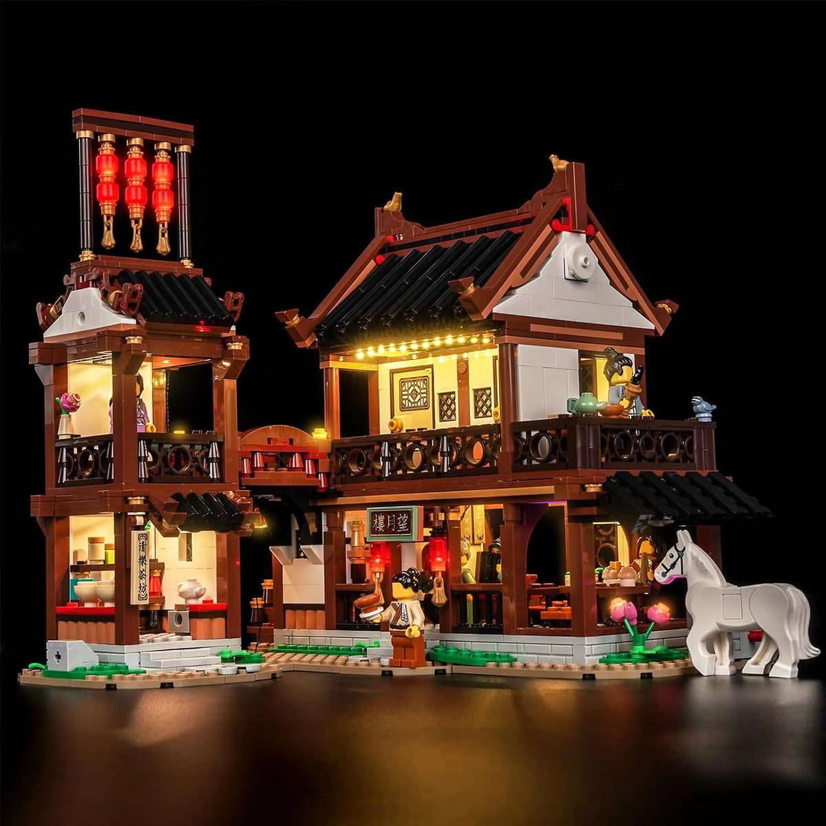 Ancient-style brick inn model lit with warm LED lights at night – view 2