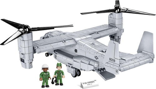 Brick-built military tiltrotor transport aircraft model in grey with twin rotors