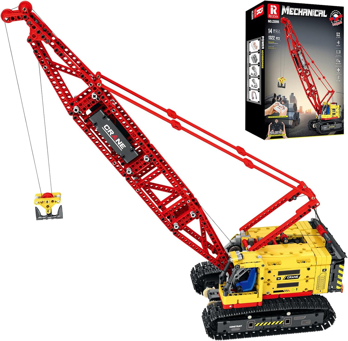 Brick-built yellow technical crawler crane with long boom and remote