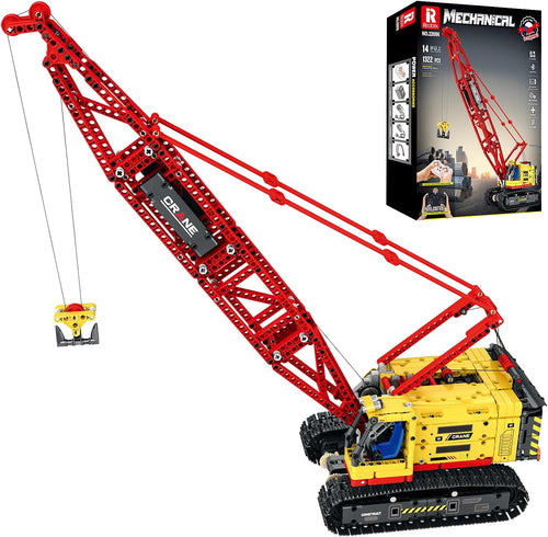 Brick-built yellow technical crawler crane with long boom and remote