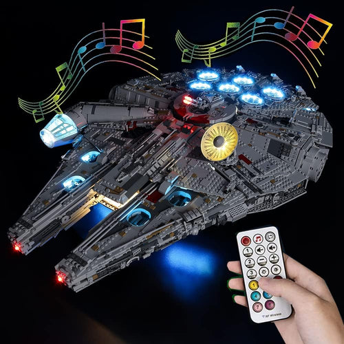 Lit space freighter brick model glowing with blue engine lights