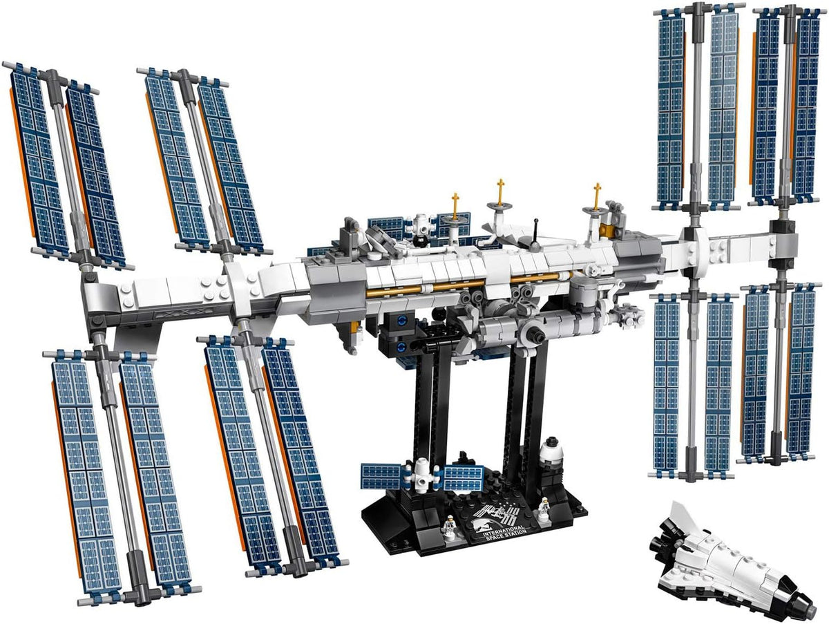 Brick-built International Space Station on a display stand with mini shuttle