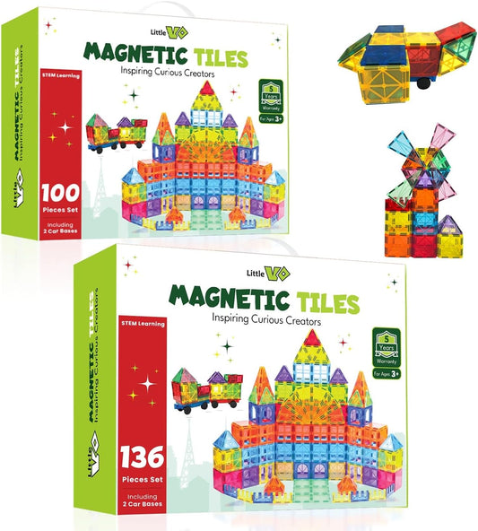 Colorful magnetic tiles built into a structure with four magnetic toy cars