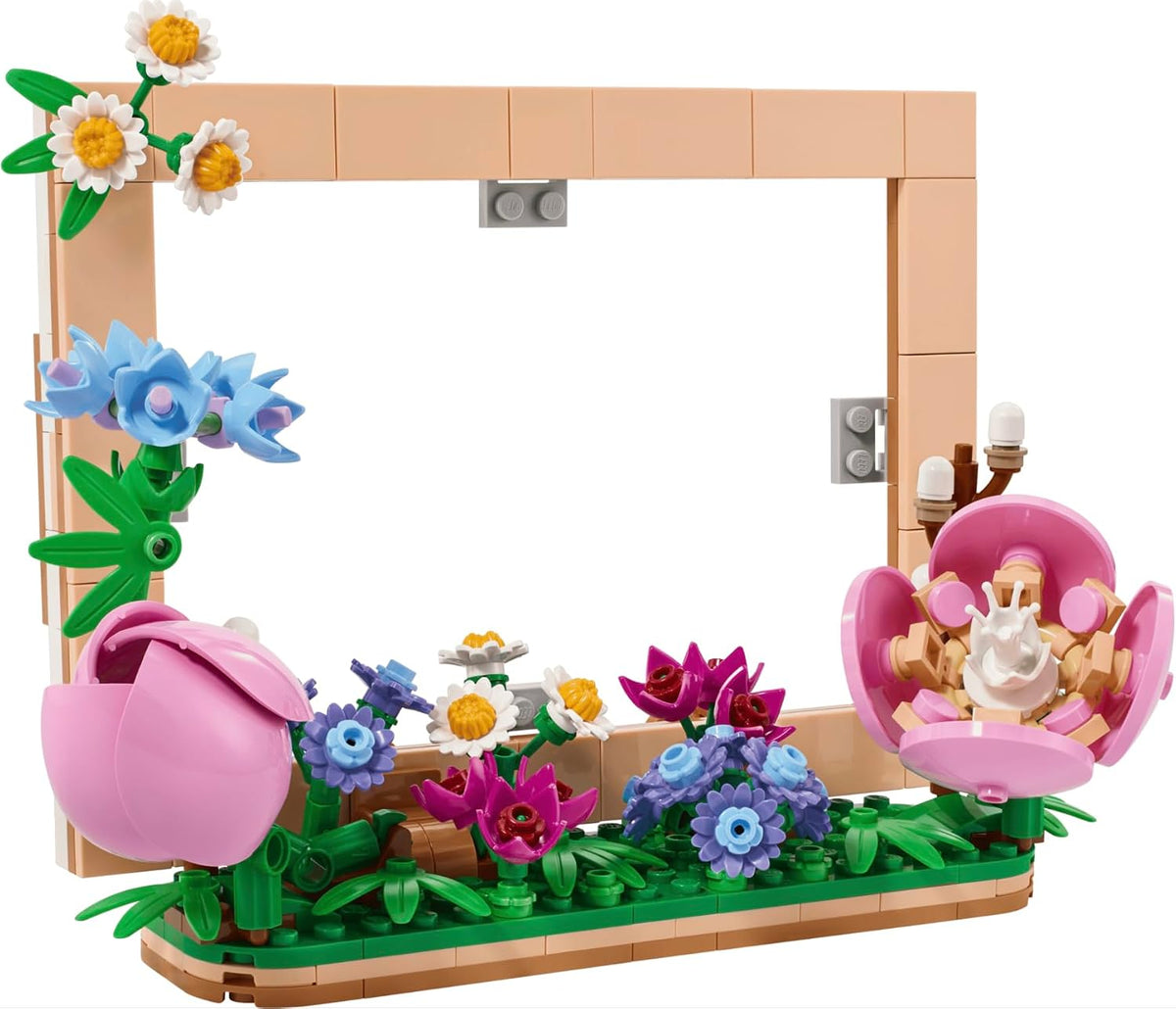 Built brick picture frame decorated with daisy, rose and camellia flowers holding a photo