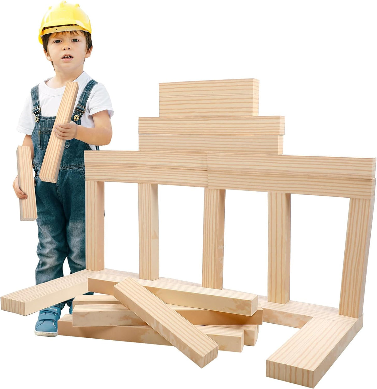 Gray foam building bricks of assorted sizes stacked into a small wall – view 2