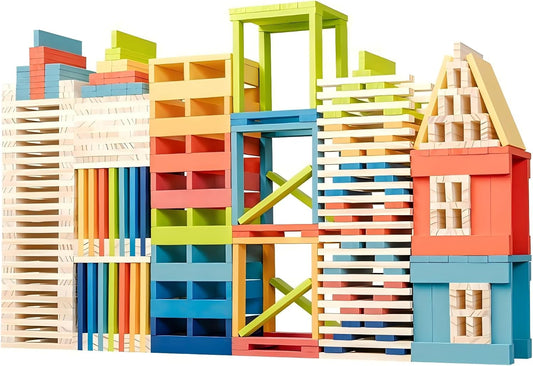Rainbow-colored wooden pine planks stacked into a tower and bridge