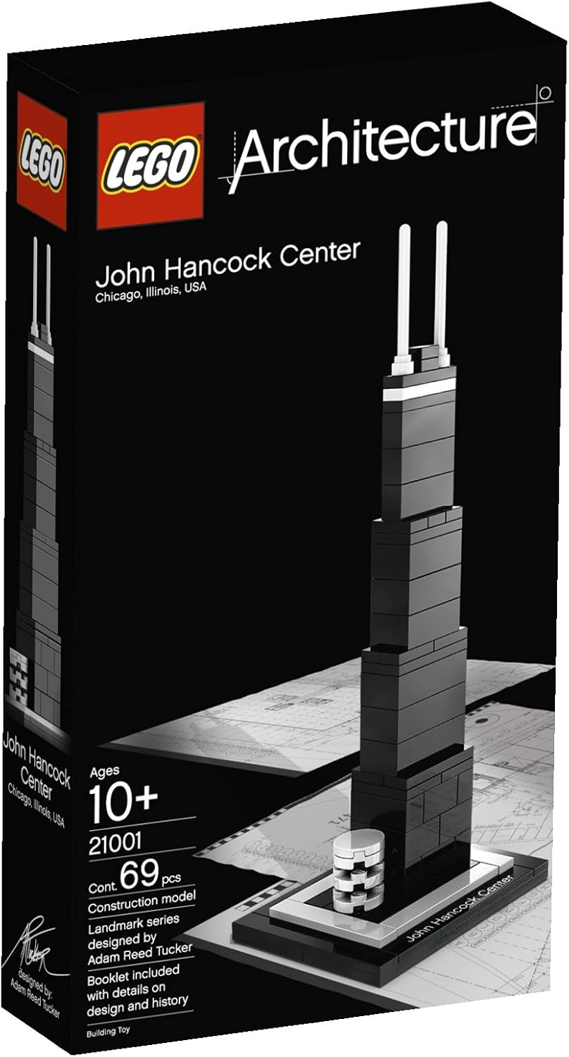 Small black and white brick model of the John Hancock Center on a labeled base