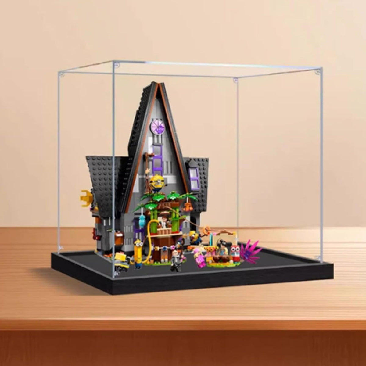 Cube acrylic display case around a luxury home brick model