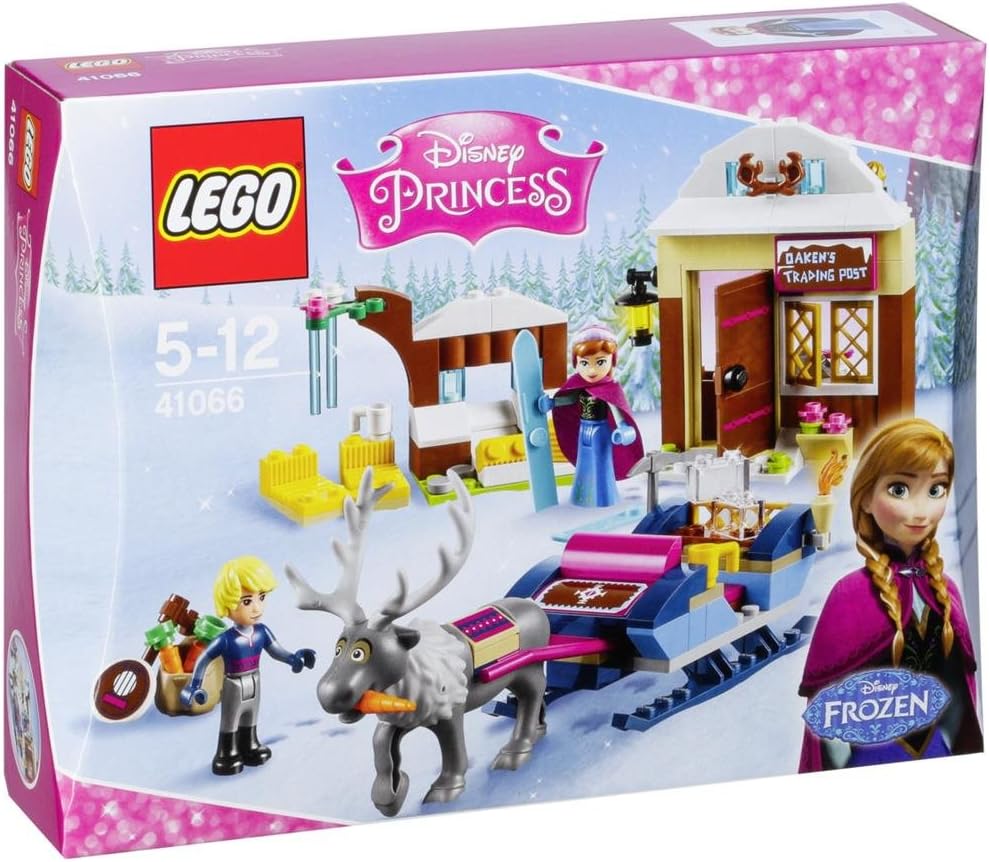Brick-built sleigh with reindeer in front of a small snowy trading post and barn
