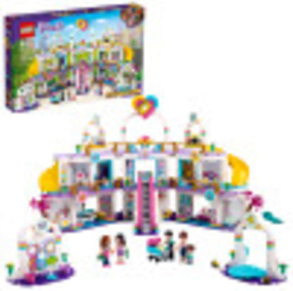 Colorful brick-built three-story shopping mall with escalator, shops and figures – view 2
