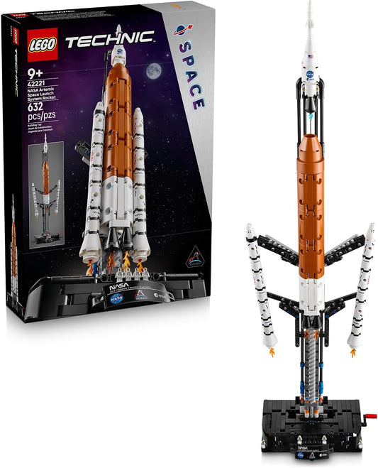 Tall orange and white brick rocket with side boosters on a launch base