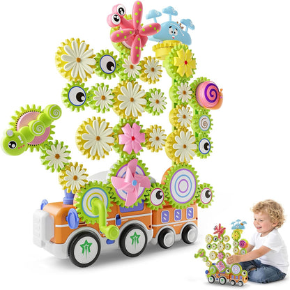 Colorful plastic gear building set forming a flower and a train – view 5