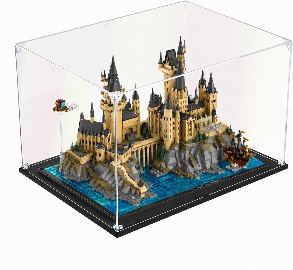 Clear acrylic display box holding a round superhero shield brick model – view 3