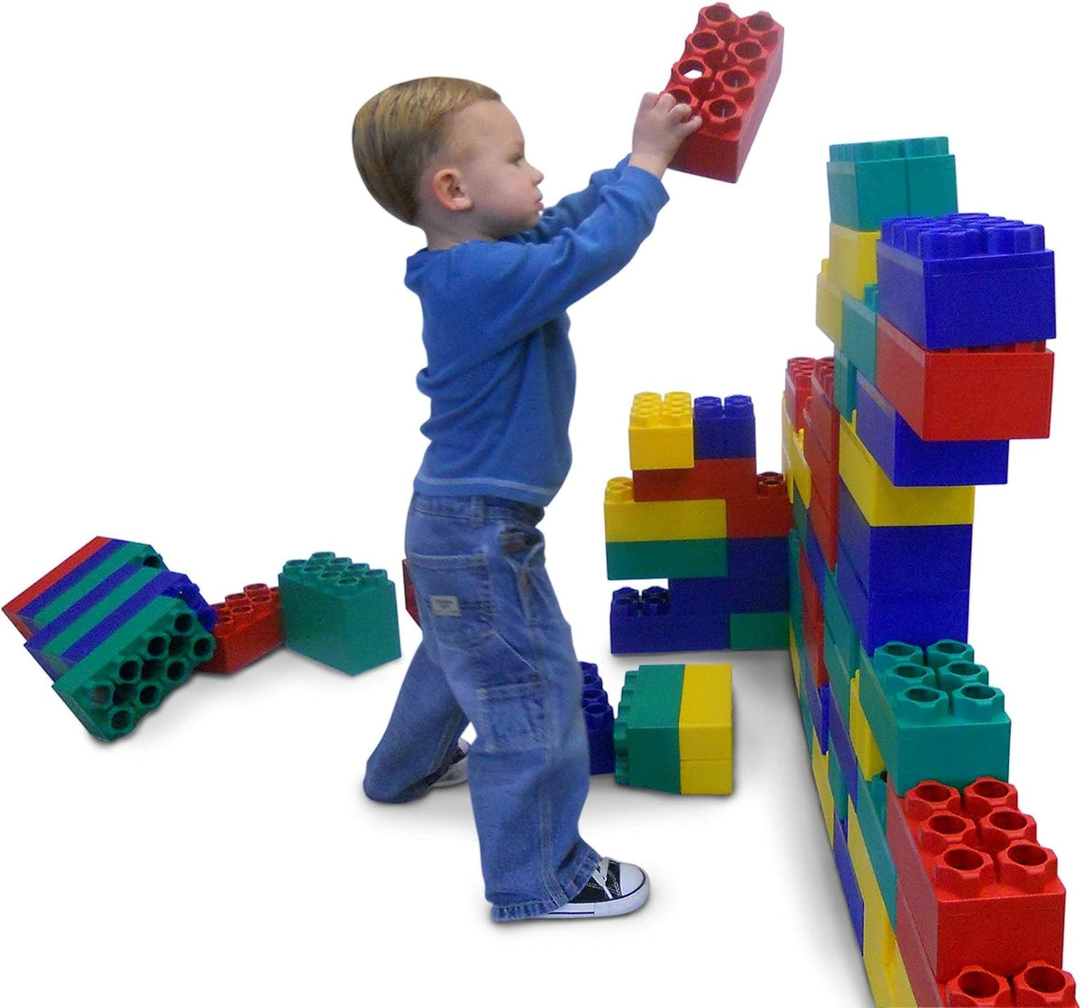 Pile of oversized colorful interlocking toddler building blocks