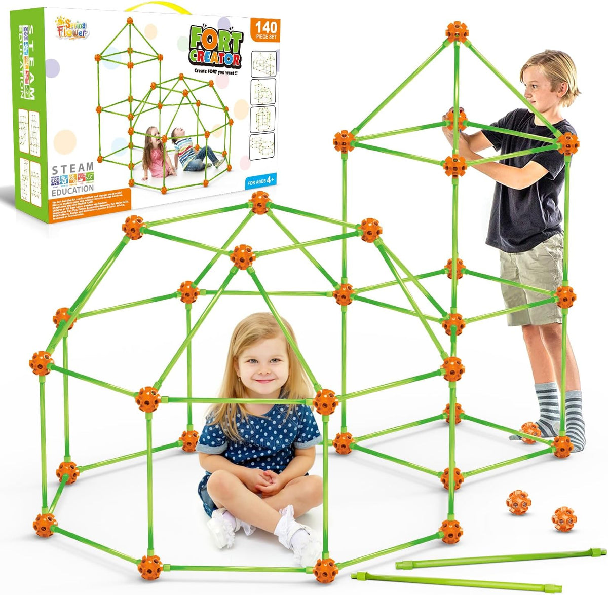 Child-sized fort made of rods and connector balls glowing green in a dark room – view 4
