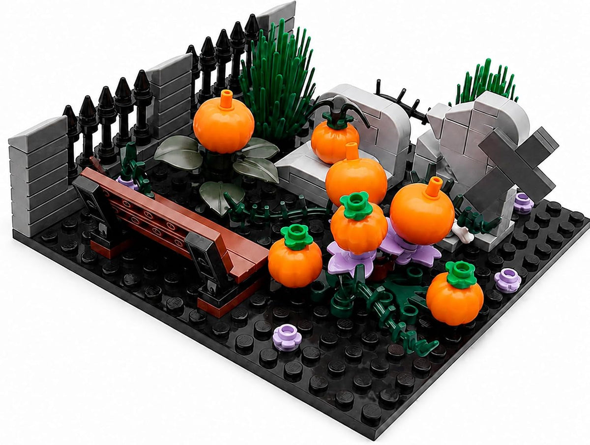 Brick-built Halloween graveyard with gates, tombstones, ghosts and pumpkins – view 3