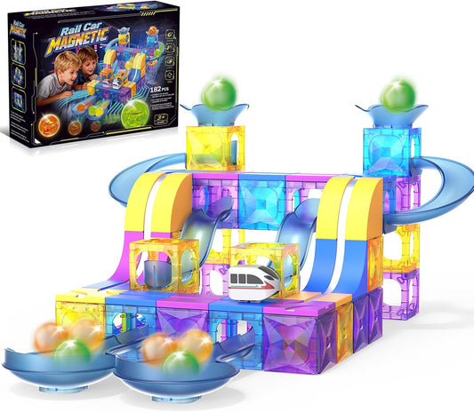 Magnetic tile tower with marble run track and electric train