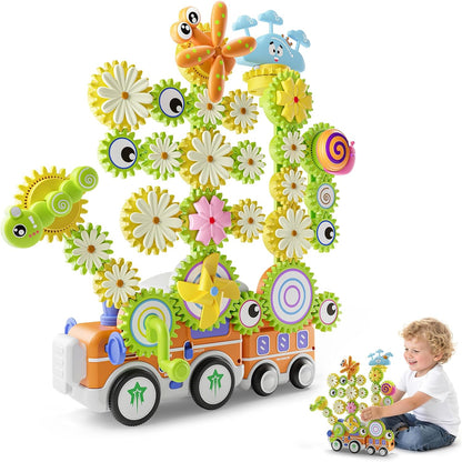 Colorful plastic gear building set forming a flower and a train – view 6
