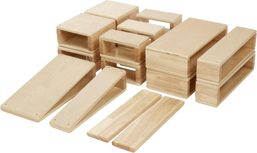 Natural hollow wooden building blocks stacked into a small wall