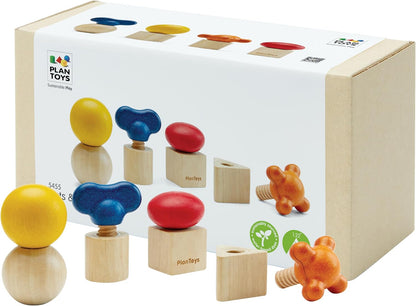 Colorful wooden gears mounted on a board – view 3