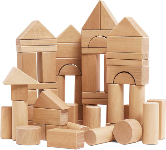 Natural wood building blocks stacked into a simple tower and arch