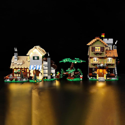 Medieval town square brick model glowing with warm LED lights at night