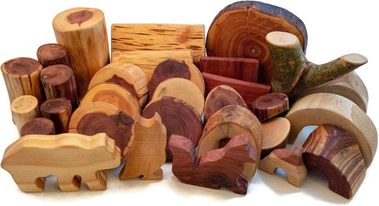 Handmade hardwood tree branch blocks with bark edges and bear, fox and owl shapes