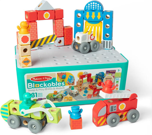 Wooden block rescue town with fire station, fire engine and ambulance