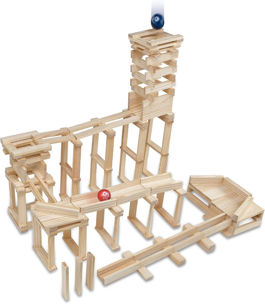 Wooden planks stacked into a marble run with ramps and a ball rolling down