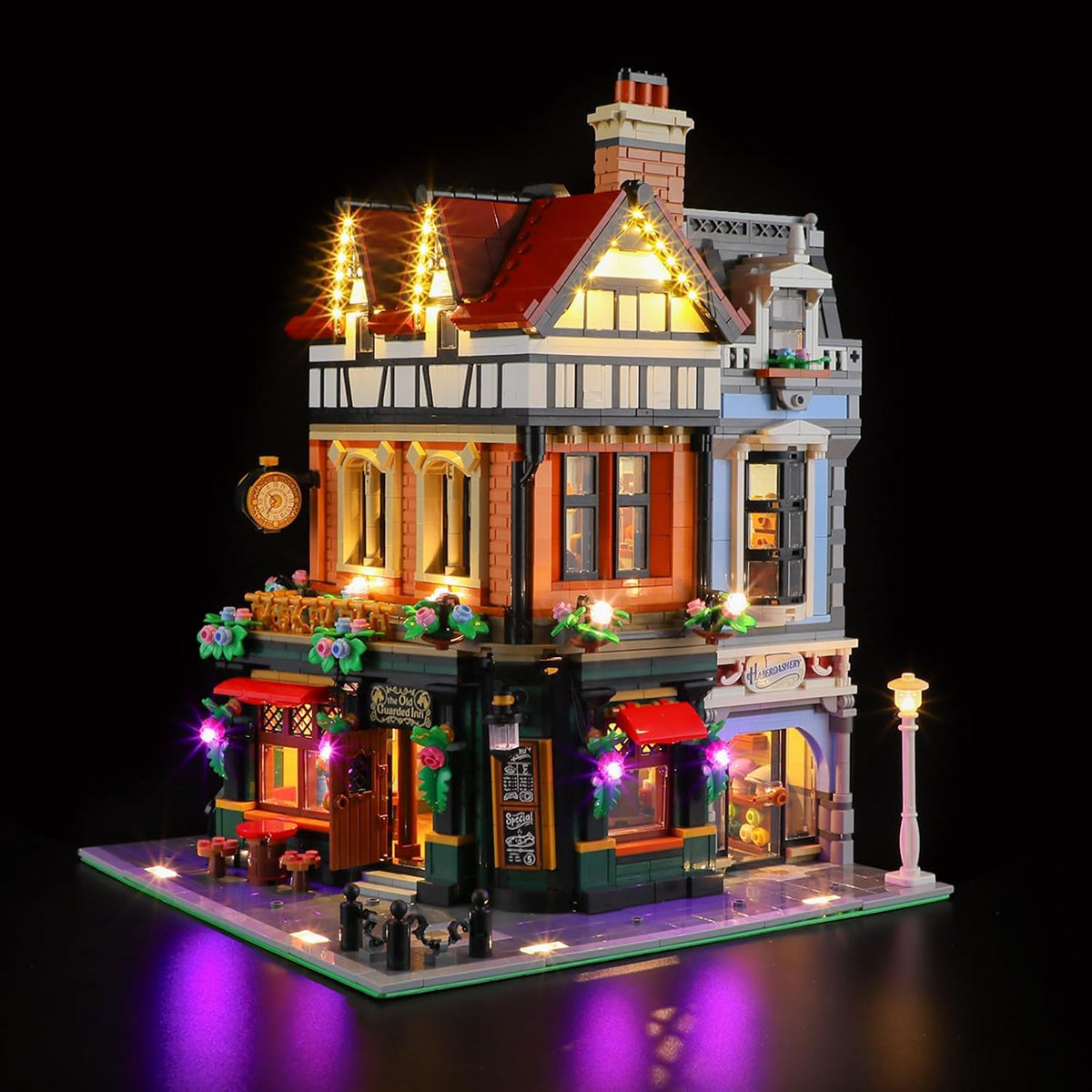 LED light kit illuminating a Tudor-style corner building brick model – view 2