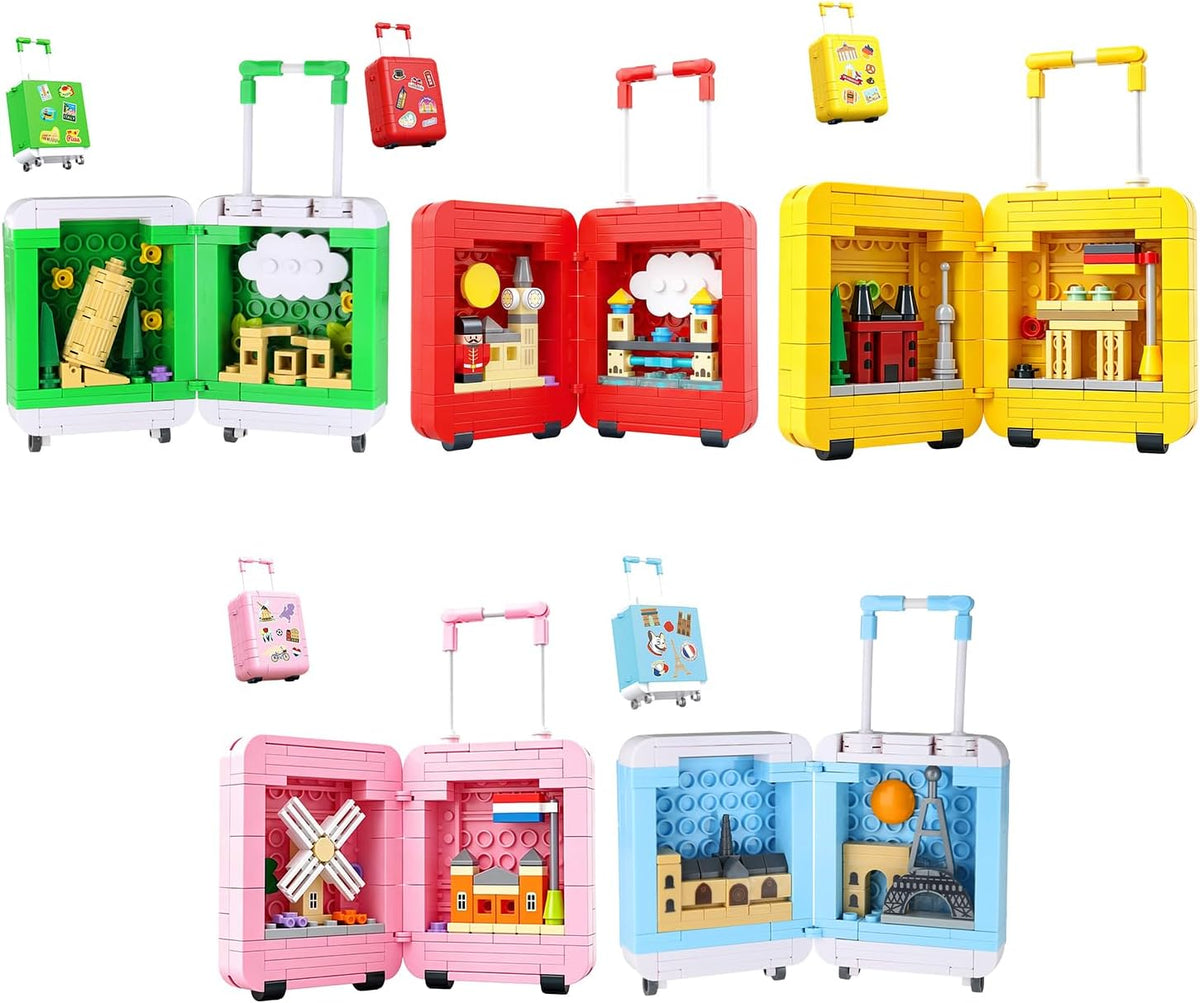 Five small brick-built suitcases opened to show miniature European cityscapes