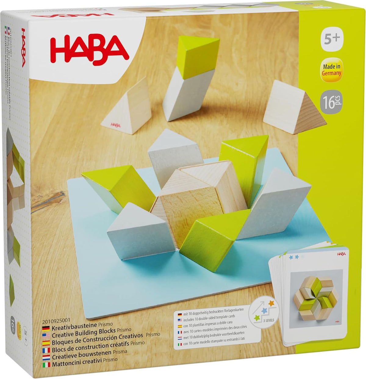 Wooden prism blocks with slanted sides stacked to match a pattern card